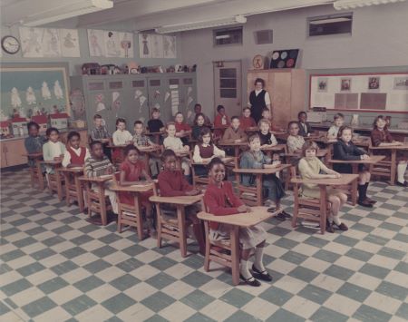 Photograph of Ms. Woody's third grade class at Mountain View Elementary School during the first year of desegregation in Burke County. Faced with many years of activism by Black families, especially the West Concord Mothers, local churches, and NAACP, as well as the threat of losing federal funding with the Civil Rights Act of 1964, Burke County's schools consolidated and desegregated in 1965. The three previously separate school systems (Morganton City, Glen Alpine, and Burke County) merged into one, and all students were assigned to the school closest to their home. From its opening in 1958 to 1965, Mountain View Elementary was an all-Black school serving grades one through eight. As a result of desegregation in 1965, only 12 of the 26 Black teachers in the school system were rehired. Later that year, nine Black teachers who were not rehired sued the Morganton City School Board. In the case of Arthur Baglis Buford, et al v. The Morganton City Board of Education, Judge Braxton Craven ultimately rejected the teachers' argument of discrimination and sided with the School Board. Desegregation resulted in many Black teachers leaving Burke County due to this loss of employment.
